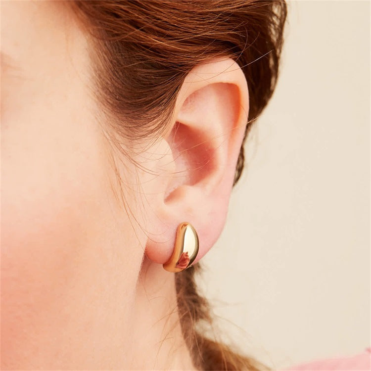 Lindsay - Smooth Huggie Earrings — designed to inspire your lifestyle. Lindsay - Smooth Huggie Earrings — designed to inspire your lifestyle.