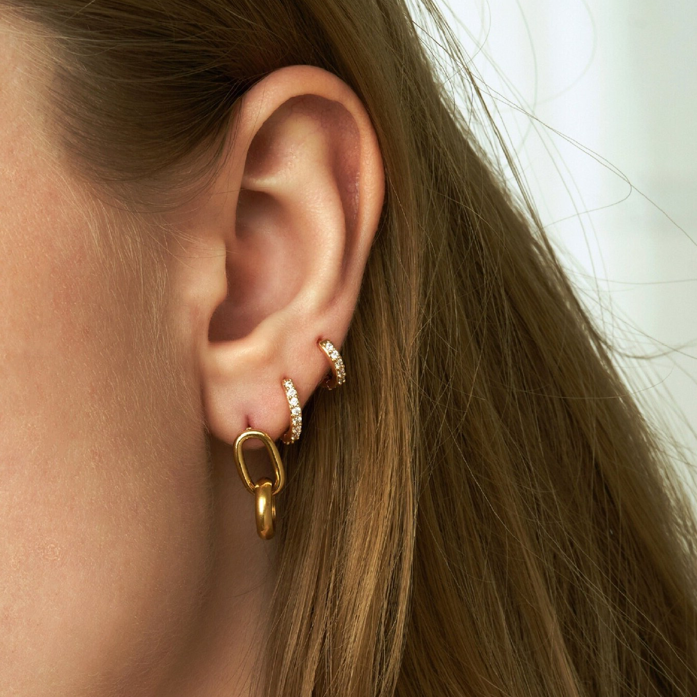 Nova - Classic Huggie Earrings — perfect for those who value comfort and design. Nova - Classic Huggie Earrings — perfect for those who value comfort and design.