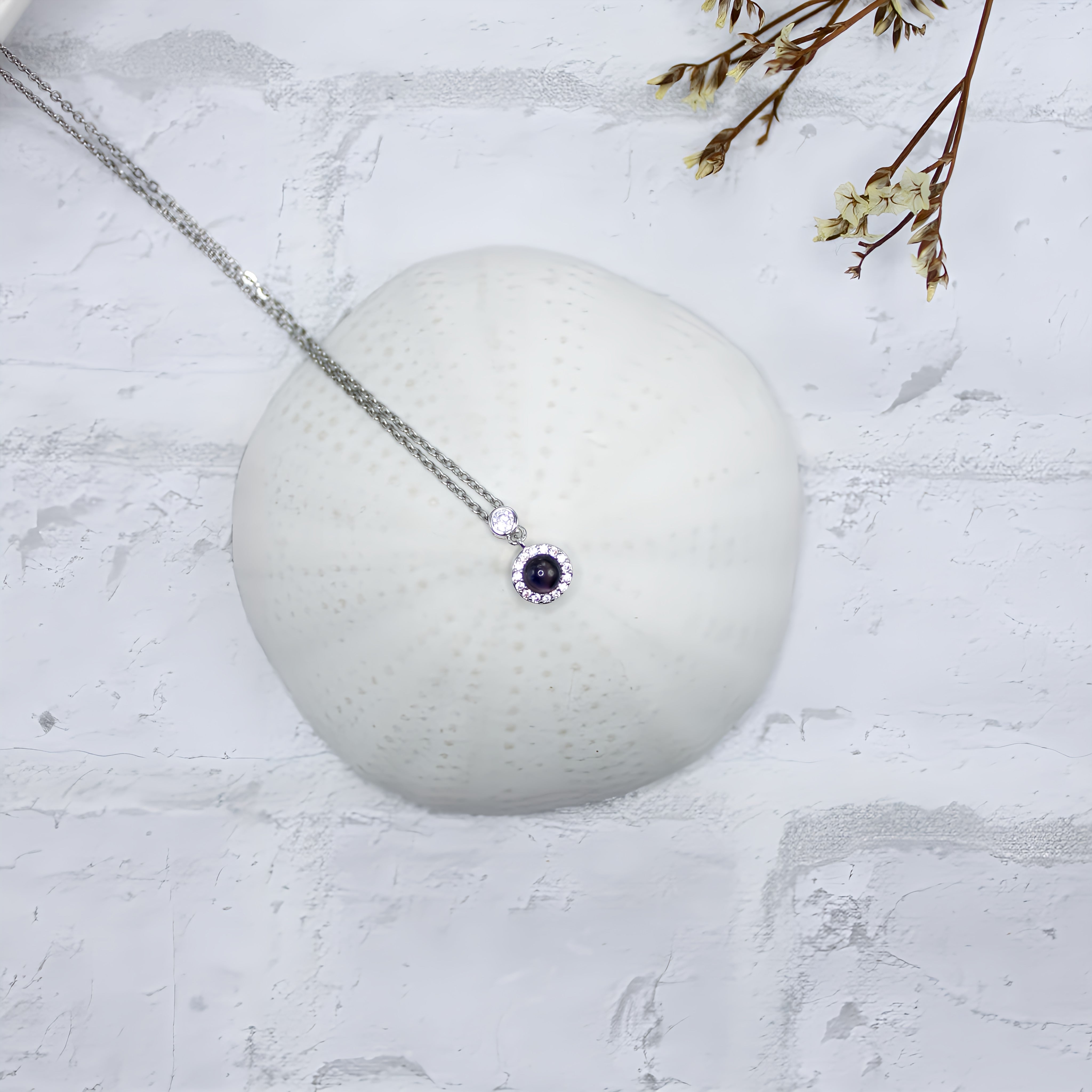 Globe Projection Charm Necklace — made with care and attention to detail. Globe Projection Charm Necklace — made with care and attention to detail.