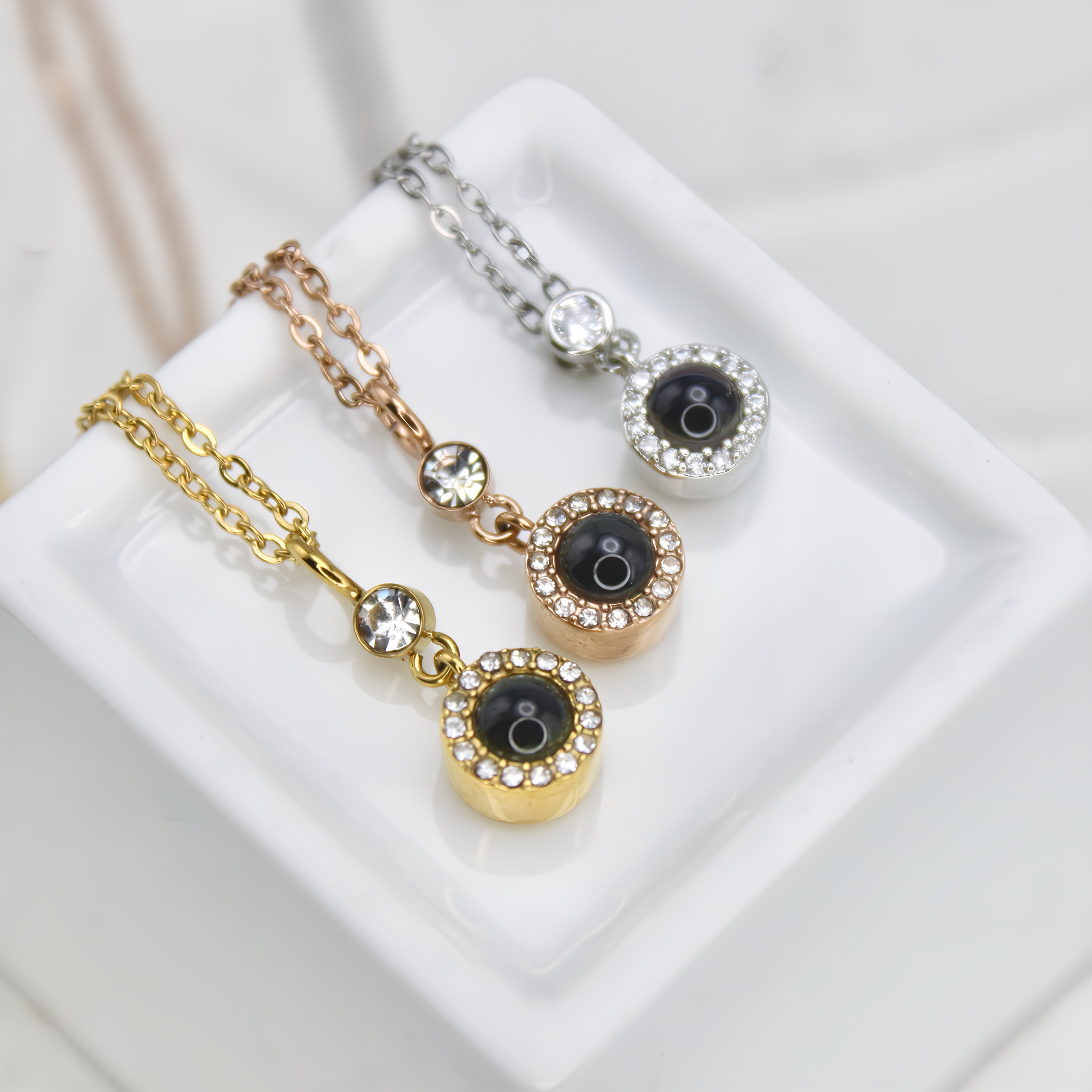 Globe Projection Charm Necklace — made with care and attention to detail. Globe Projection Charm Necklace — made with care and attention to detail.