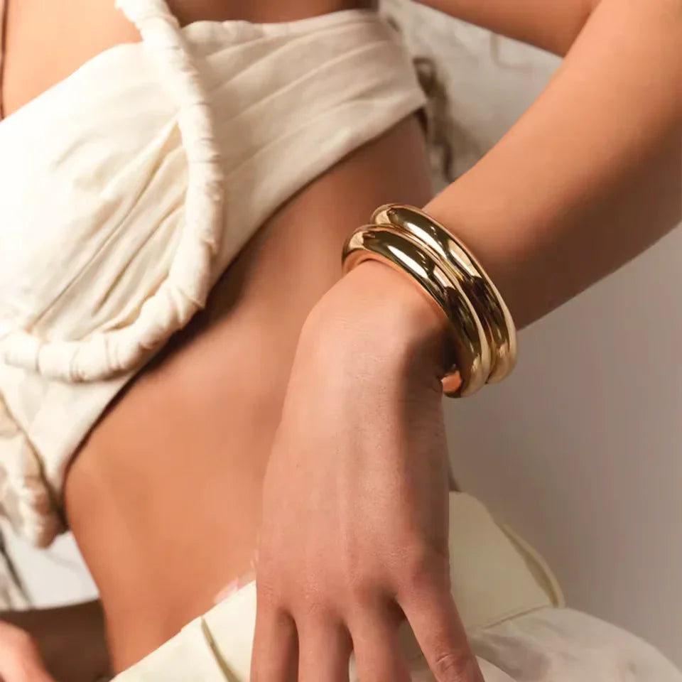 Freya - Smooth Gold Bangle — designed to inspire your lifestyle. Freya - Smooth Gold Bangle — designed to inspire your lifestyle.