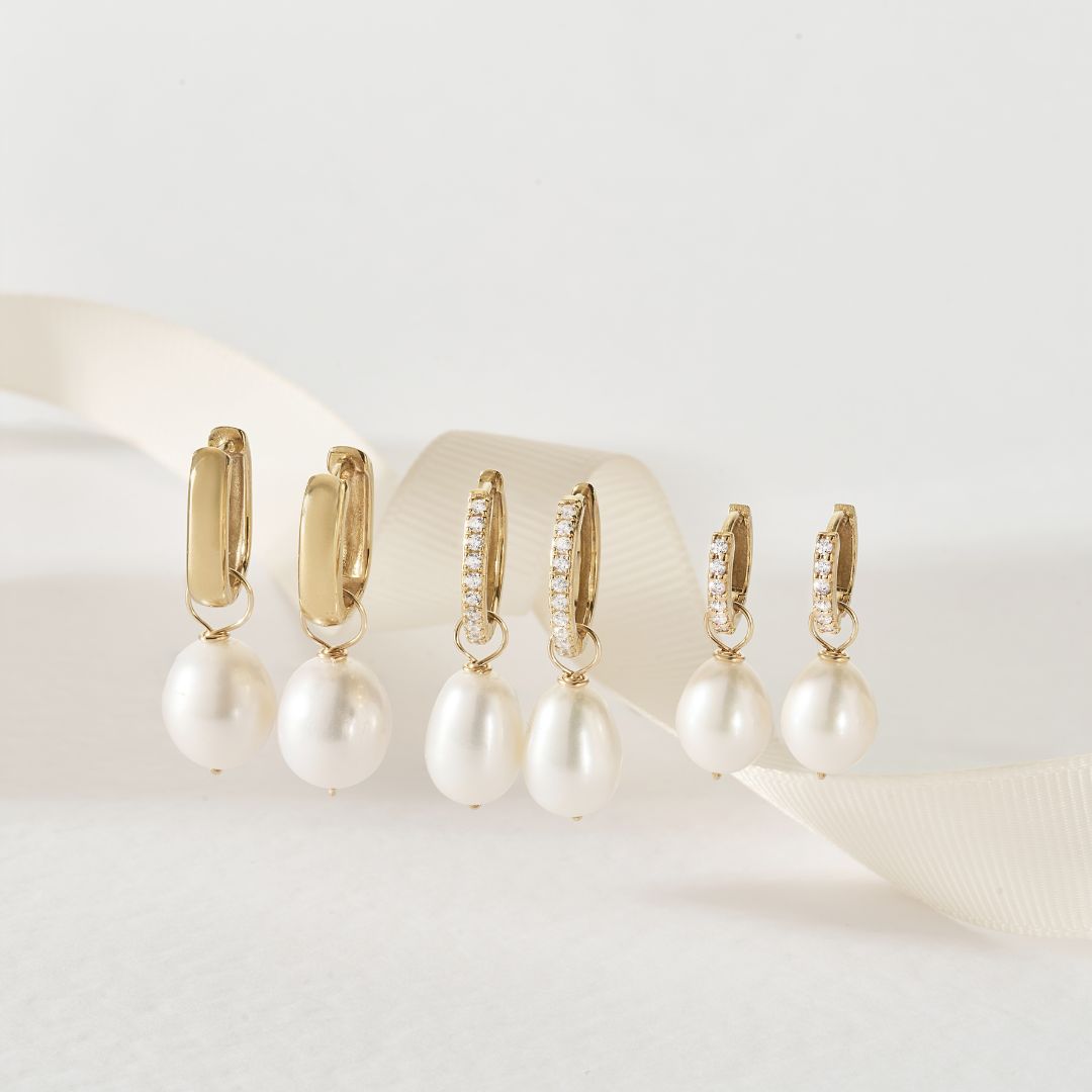 Diamond-Style Gold Drop Hoop Earrings — crafted for everyday quality. Diamond-Style Gold Drop Hoop Earrings — crafted for everyday quality.