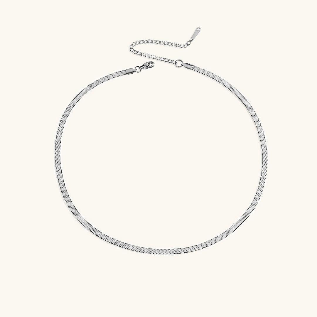 Flora - Bold Herringbone Necklace — bringing modern charm to your space. Flora - Bold Herringbone Necklace — bringing modern charm to your space.