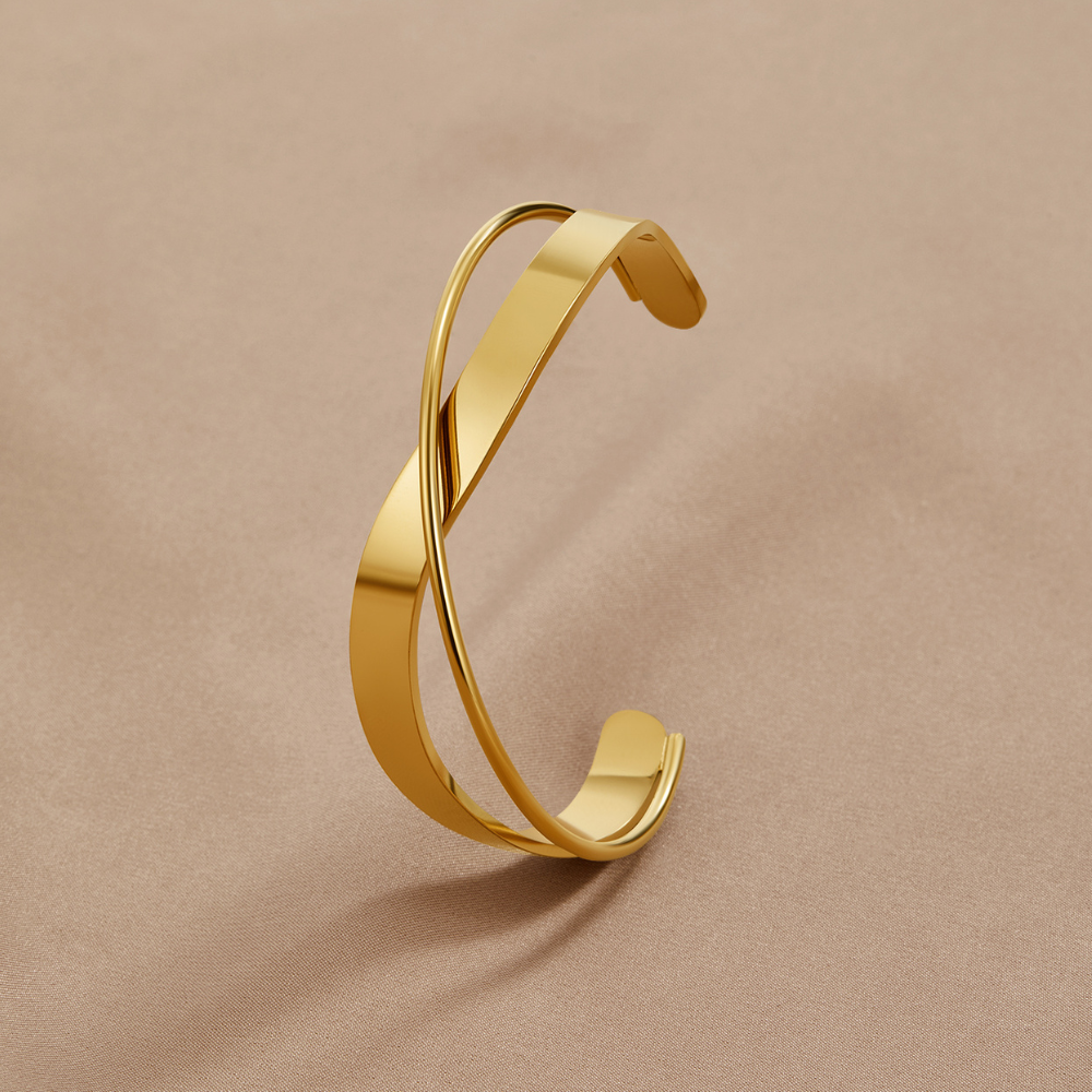 Sloan - Gold Curve Bangle — crafted for everyday quality. Sloan - Gold Curve Bangle — crafted for everyday quality.