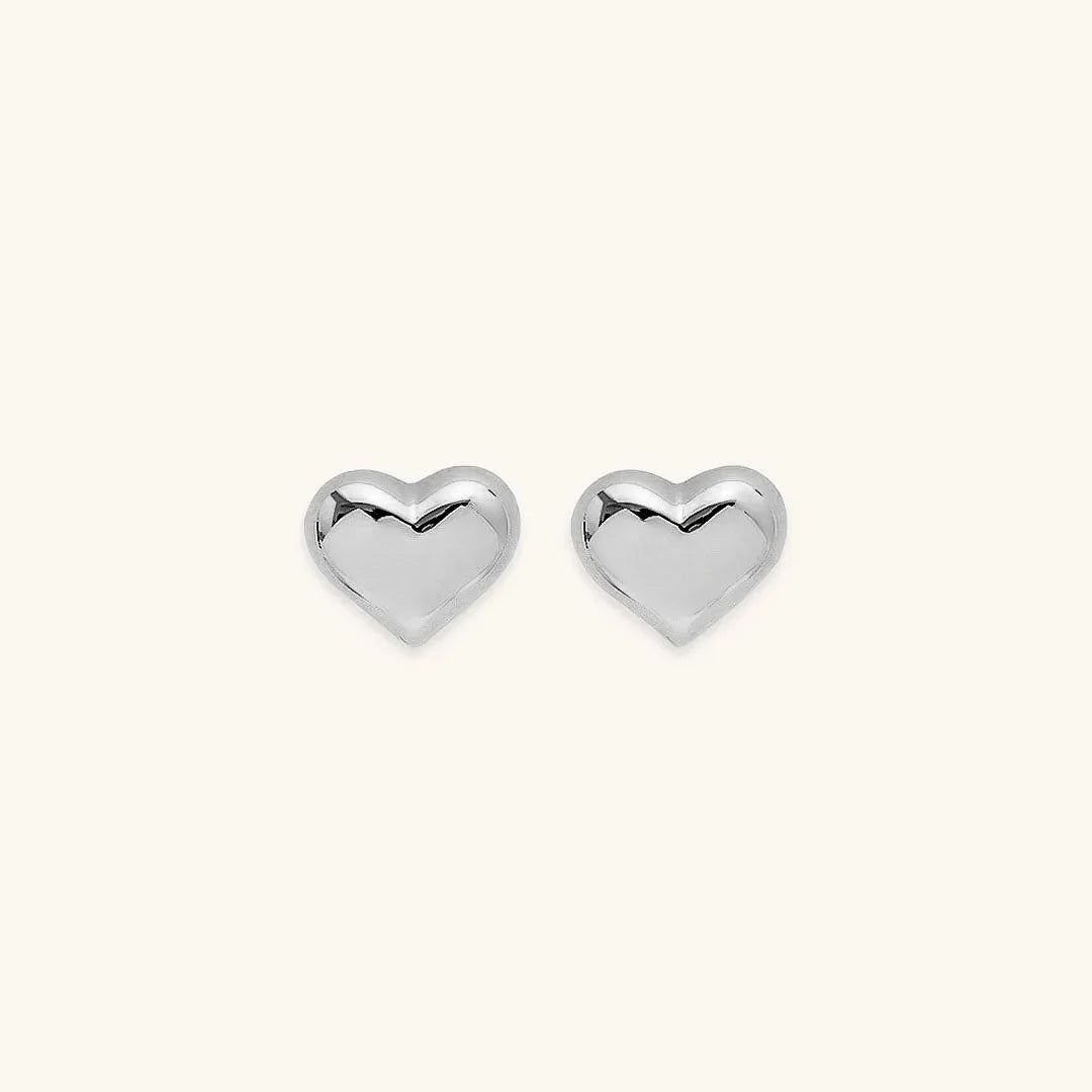 Tegan - Heart Earrings — bringing modern charm to your space. Tegan - Heart Earrings — bringing modern charm to your space.