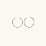 Eloise - Wide Round Hoops — made with care and attention to detail. Eloise - Wide Round Hoops — made with care and attention to detail.