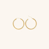 Eloise - Wide Round Hoops — made with care and attention to detail. Eloise - Wide Round Hoops — made with care and attention to detail.