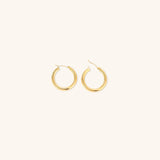 Eloise - Wide Round Hoops — made with care and attention to detail. Eloise - Wide Round Hoops — made with care and attention to detail.