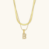 Marissa - Layered Gold Initial Letter Necklace — bringing modern charm to your space. Marissa - Layered Gold Initial Letter Necklace — bringing modern charm to your space.