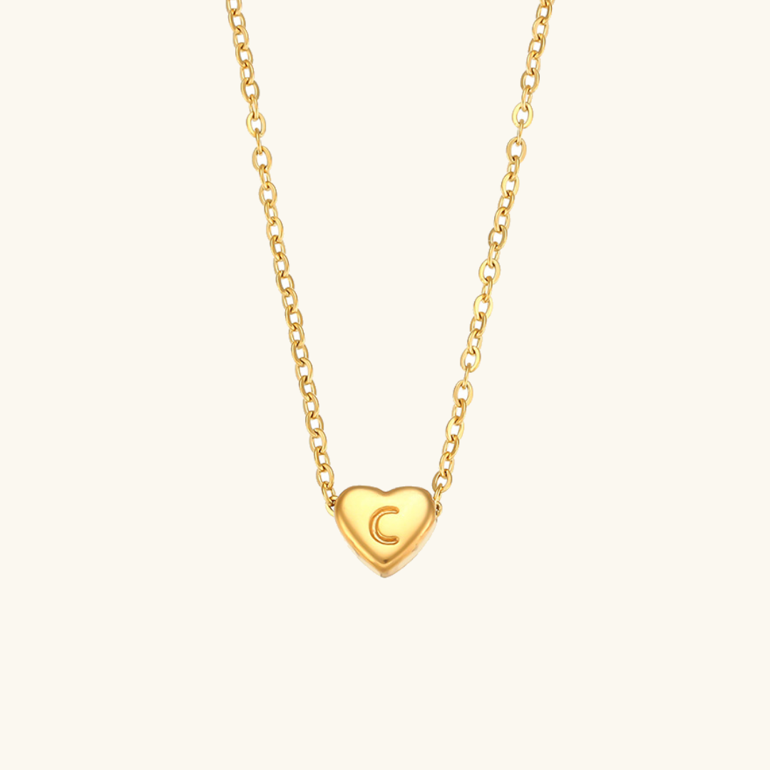 Juliette - Heart Initial Gold Necklace — crafted for everyday quality. Juliette - Heart Initial Gold Necklace — crafted for everyday quality.