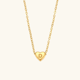 Juliette - Heart Initial Gold Necklace — crafted for everyday quality. Juliette - Heart Initial Gold Necklace — crafted for everyday quality.