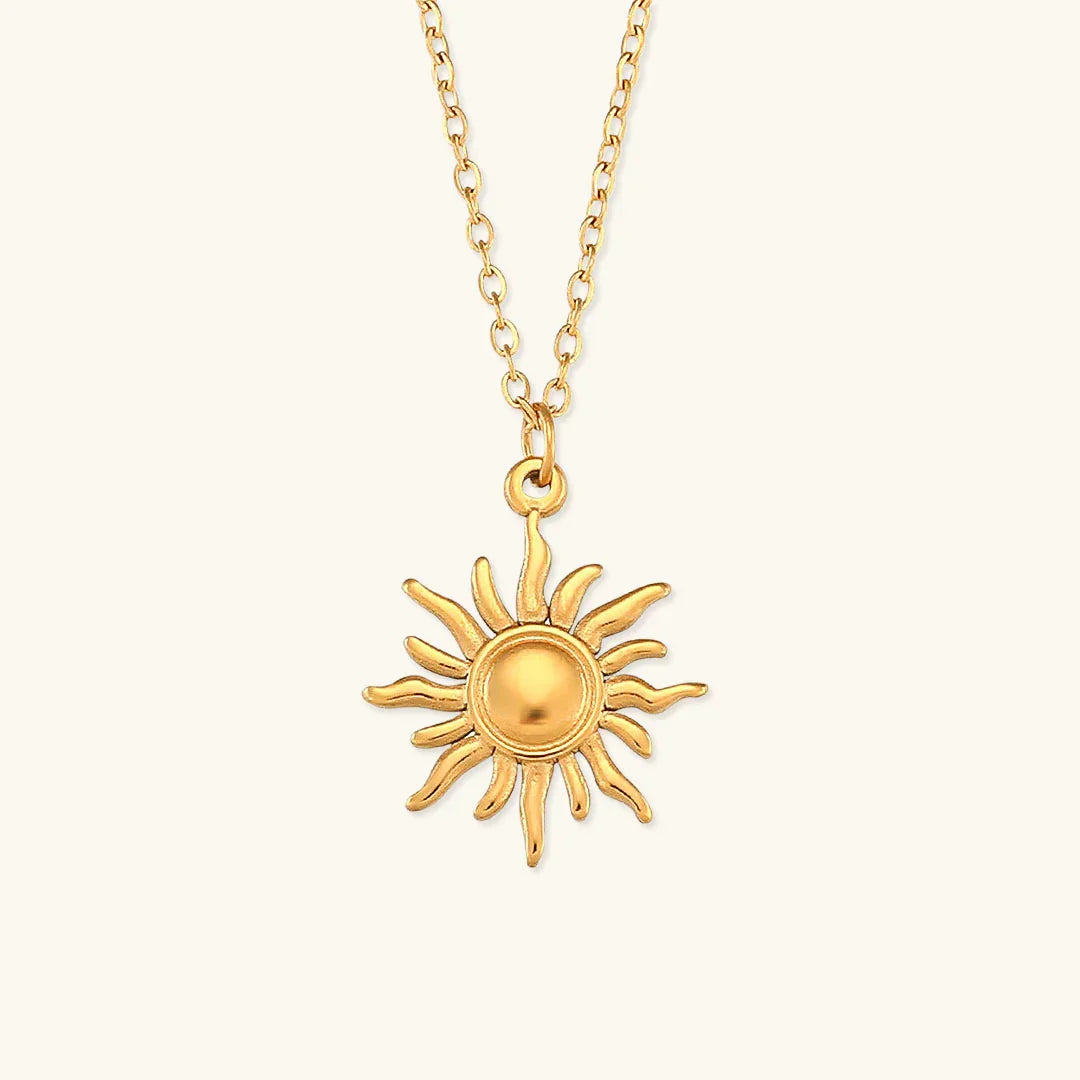 Sybil - Gold Sun Necklace — bringing modern charm to your space. Sybil - Gold Sun Necklace — bringing modern charm to your space.