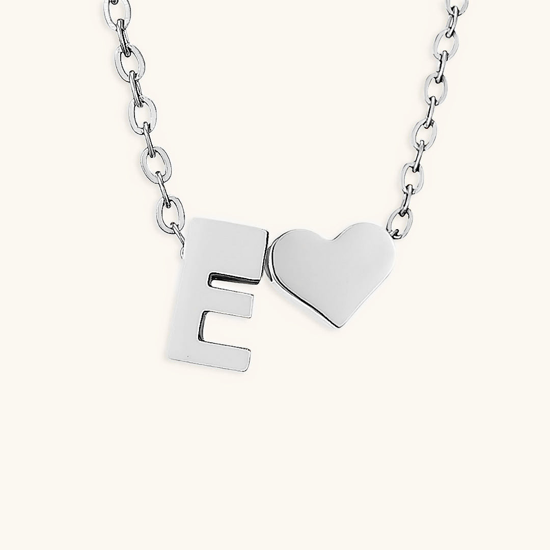 Mallory - Love Initial Letter Necklace — bringing modern charm to your space. Mallory - Love Initial Letter Necklace — bringing modern charm to your space.