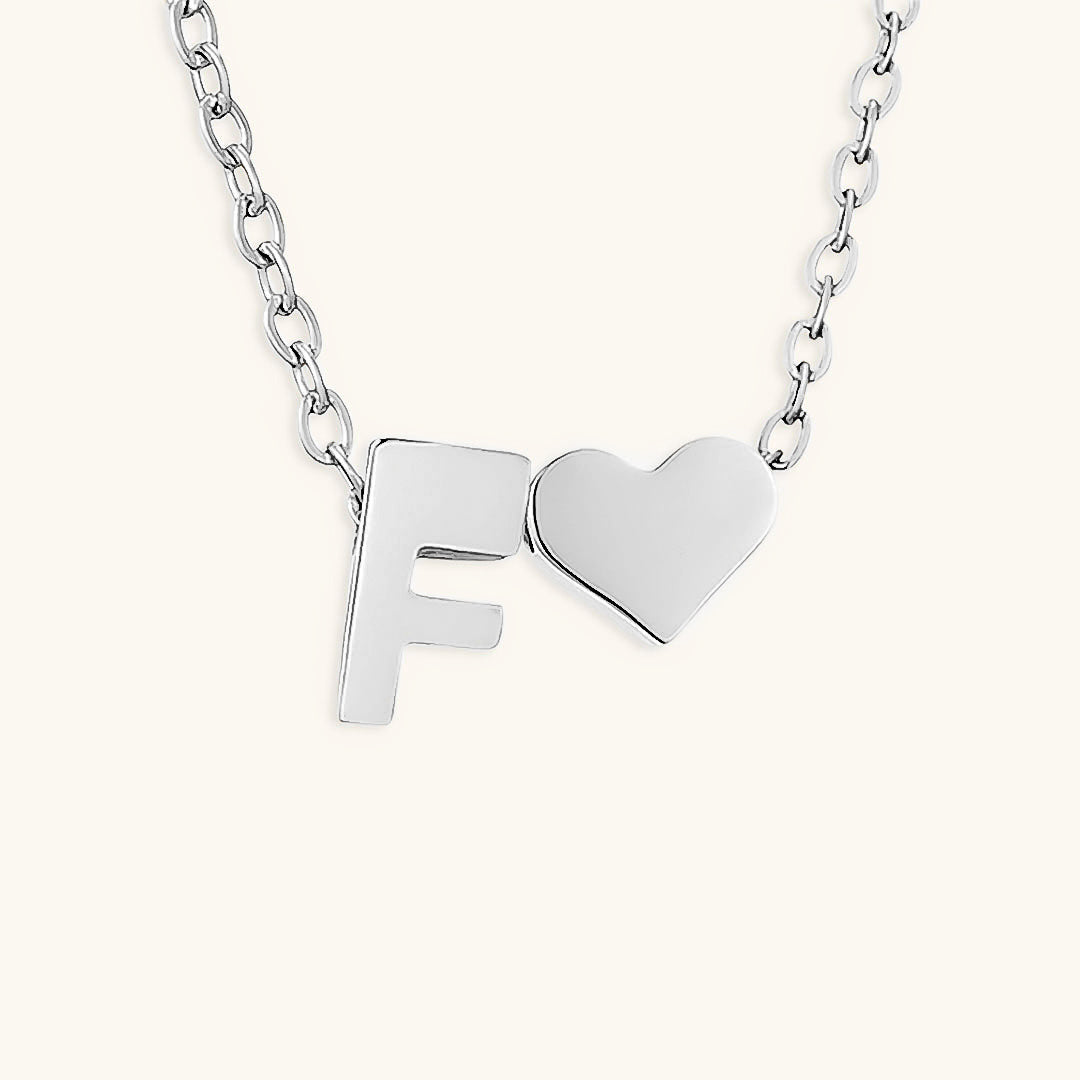 Mallory - Love Initial Letter Necklace — bringing modern charm to your space. Mallory - Love Initial Letter Necklace — bringing modern charm to your space.