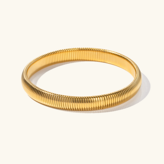 Daphne - Coil Bangle — bringing modern charm to your space.