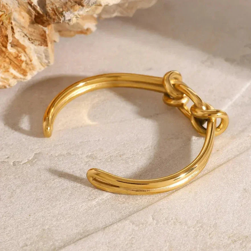 Naomi - Gold Knot Bangle — perfect for those who value comfort and design. Naomi - Gold Knot Bangle — perfect for those who value comfort and design.