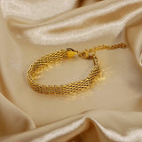 Helena - Gold Chain Bracelet — bringing modern charm to your space. Helena - Gold Chain Bracelet — bringing modern charm to your space.
