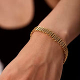 Helena - Gold Chain Bracelet — bringing modern charm to your space. Helena - Gold Chain Bracelet — bringing modern charm to your space.