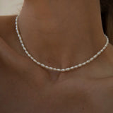 Avaria - Freshwater Pearl Choker — bringing modern charm to your space. Avaria - Freshwater Pearl Choker — bringing modern charm to your space.