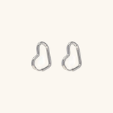 Clarissa - Heart Hoop Earrings — bringing modern charm to your space. Clarissa - Heart Hoop Earrings — bringing modern charm to your space.