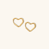 Clarissa - Heart Hoop Earrings — bringing modern charm to your space. Clarissa - Heart Hoop Earrings — bringing modern charm to your space.