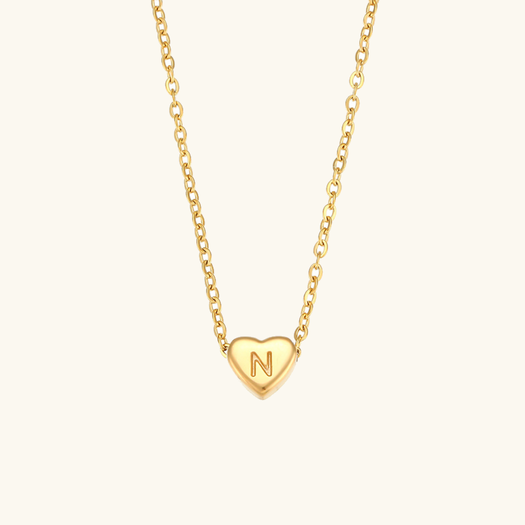 Juliette - Heart Initial Gold Necklace — crafted for everyday quality. Juliette - Heart Initial Gold Necklace — crafted for everyday quality.
