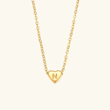 Juliette - Heart Initial Gold Necklace — crafted for everyday quality. Juliette - Heart Initial Gold Necklace — crafted for everyday quality.