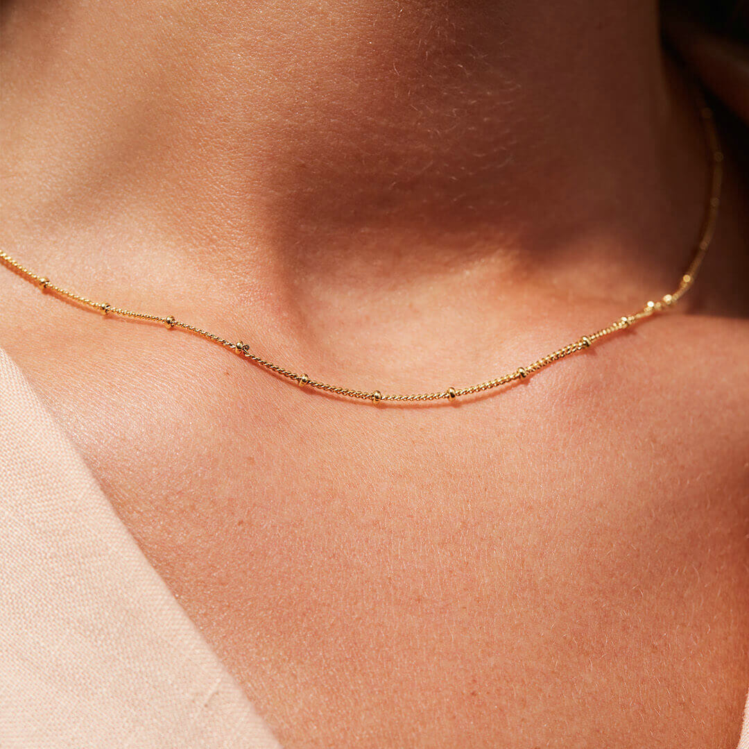 Ella - Gold Bead Chain Necklace — perfect for those who value comfort and design. Ella - Gold Bead Chain Necklace — perfect for those who value comfort and design.