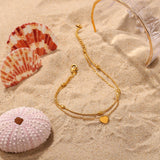 Hazel - Gold Heart Anklet — bringing modern charm to your space. Hazel - Gold Heart Anklet — bringing modern charm to your space.