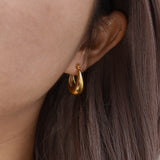 Evie - Gold Hoop Earrings — made with care and attention to detail. Evie - Gold Hoop Earrings — made with care and attention to detail.