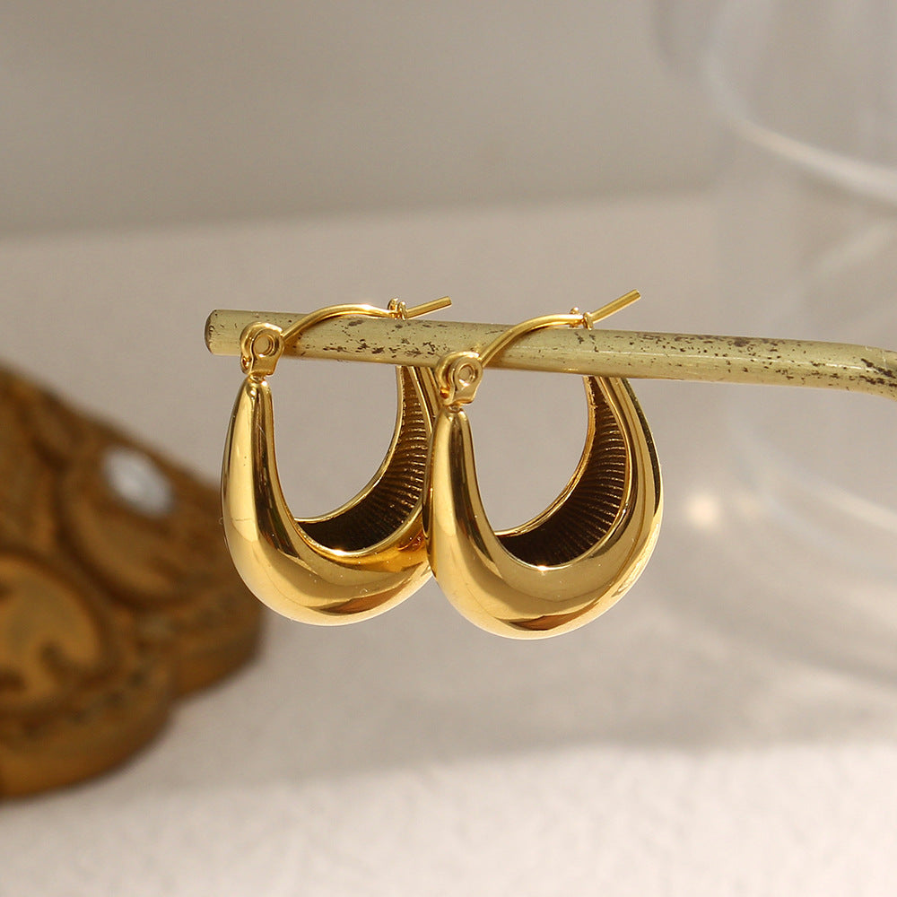 Evie - Gold Hoop Earrings — made with care and attention to detail. Evie - Gold Hoop Earrings — made with care and attention to detail.
