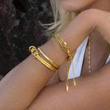 Helena - Gold Chain Bracelet — bringing modern charm to your space. Helena - Gold Chain Bracelet — bringing modern charm to your space.