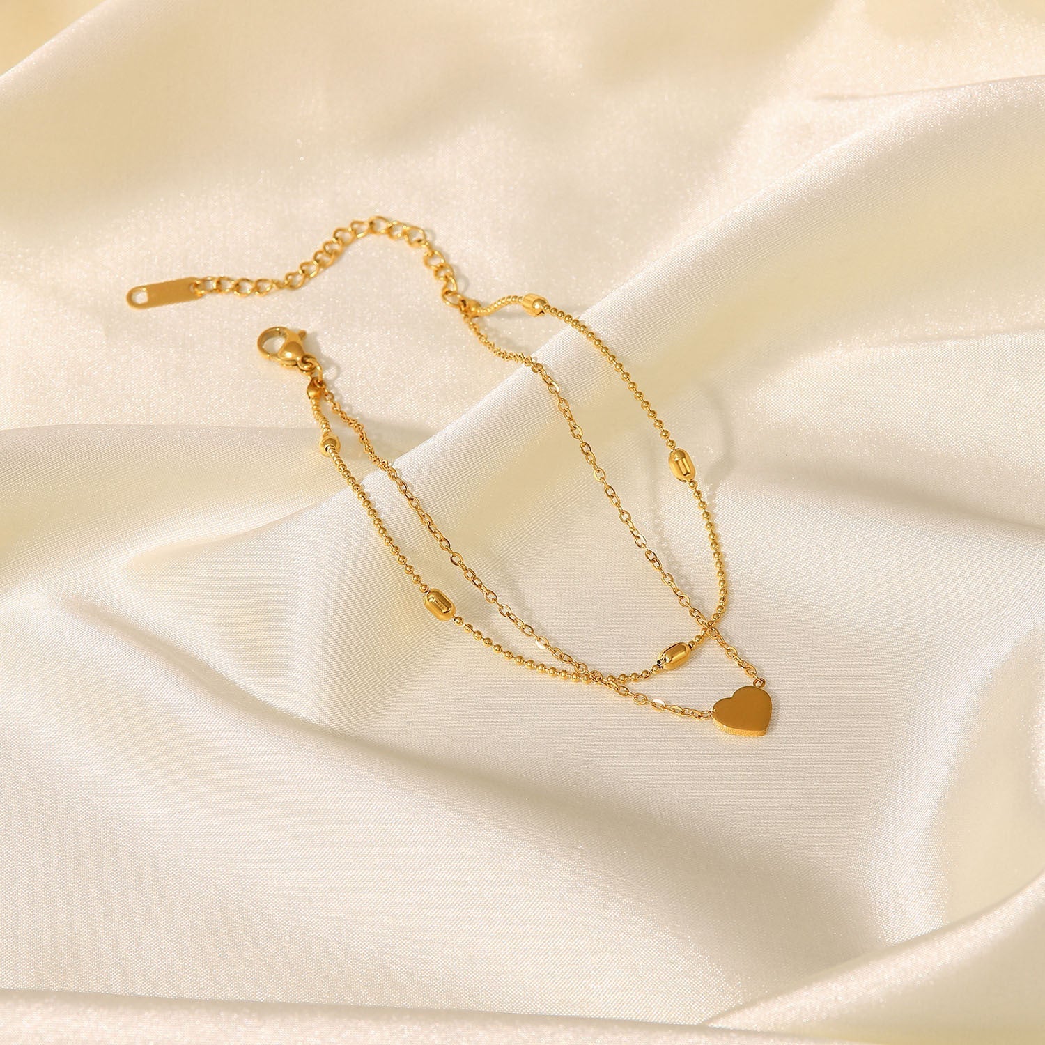 Hazel - Gold Heart Anklet — bringing modern charm to your space. Hazel - Gold Heart Anklet — bringing modern charm to your space.