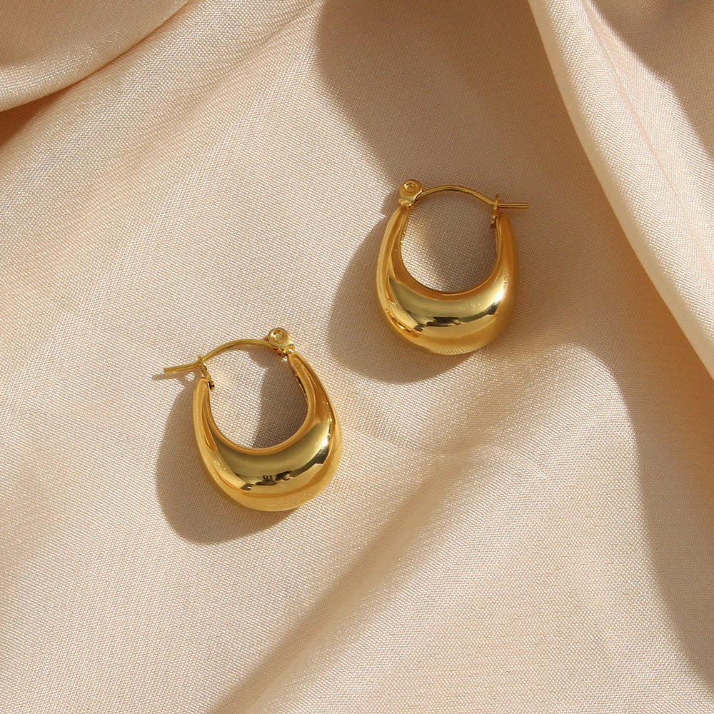 Evie - Gold Hoop Earrings — made with care and attention to detail. Evie - Gold Hoop Earrings — made with care and attention to detail.
