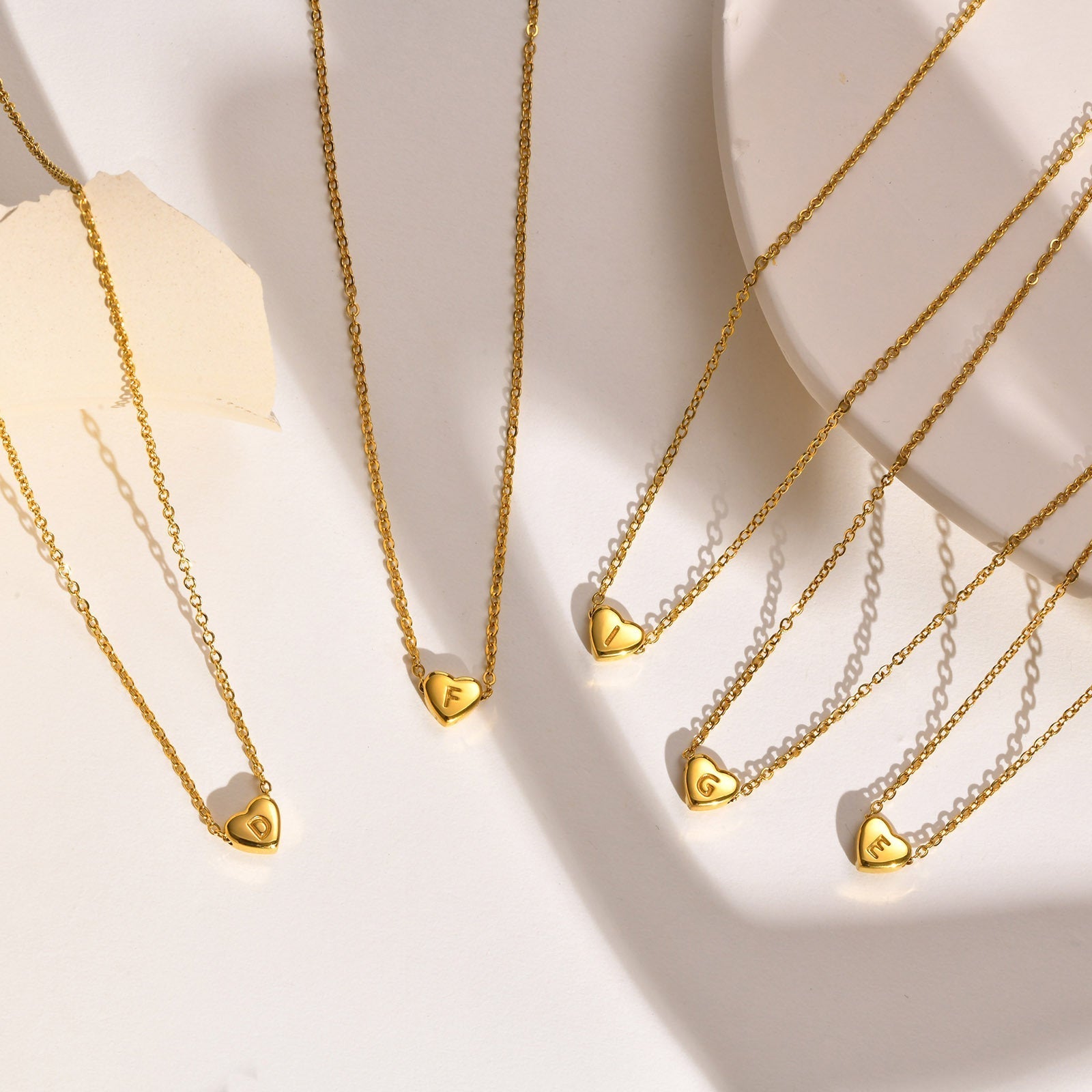Juliette - Heart Initial Gold Necklace — crafted for everyday quality. Juliette - Heart Initial Gold Necklace — crafted for everyday quality.