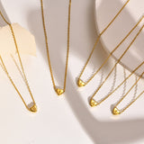 Juliette - Heart Initial Gold Necklace — crafted for everyday quality. Juliette - Heart Initial Gold Necklace — crafted for everyday quality.