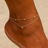 Hazel - Gold Heart Anklet — bringing modern charm to your space. Hazel - Gold Heart Anklet — bringing modern charm to your space.