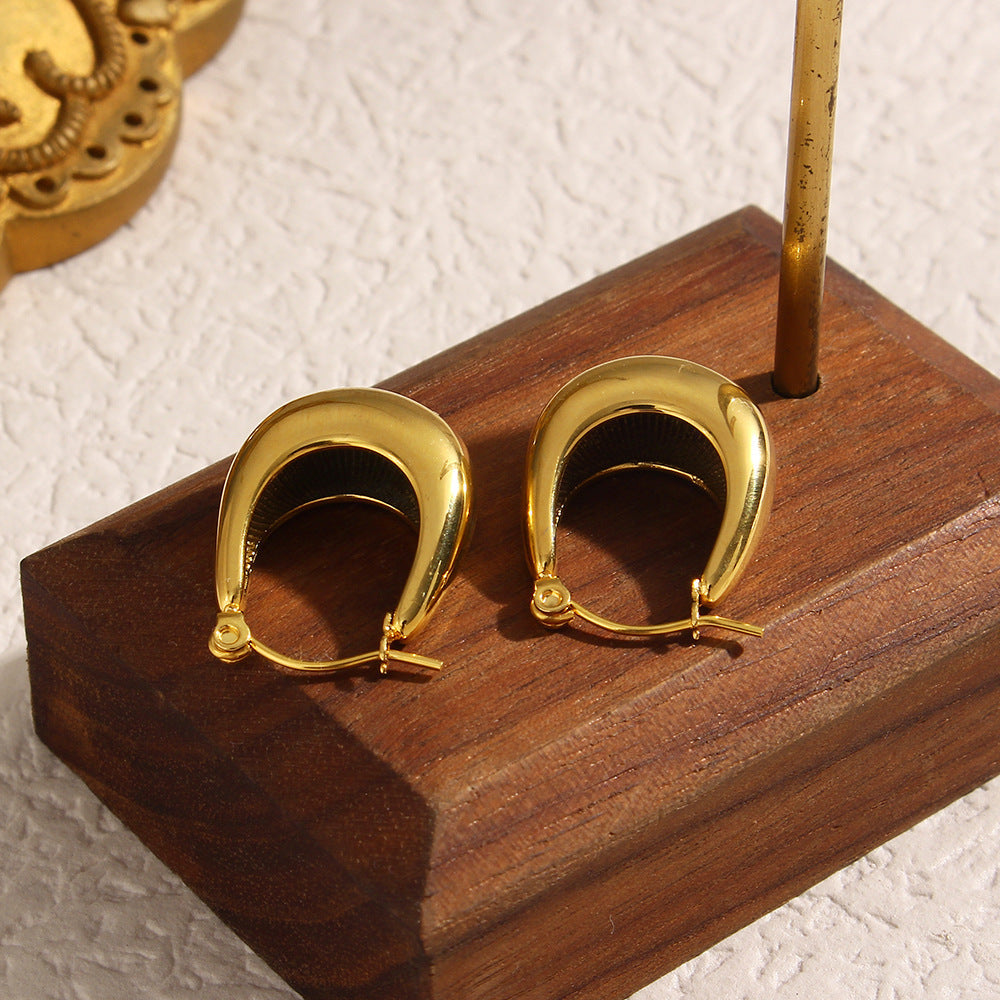 Evie - Gold Hoop Earrings — made with care and attention to detail. Evie - Gold Hoop Earrings — made with care and attention to detail.