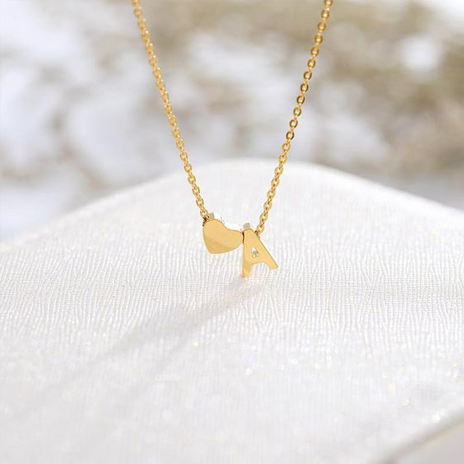 Mallory - Love Initial Letter Necklace — bringing modern charm to your space. Mallory - Love Initial Letter Necklace — bringing modern charm to your space.