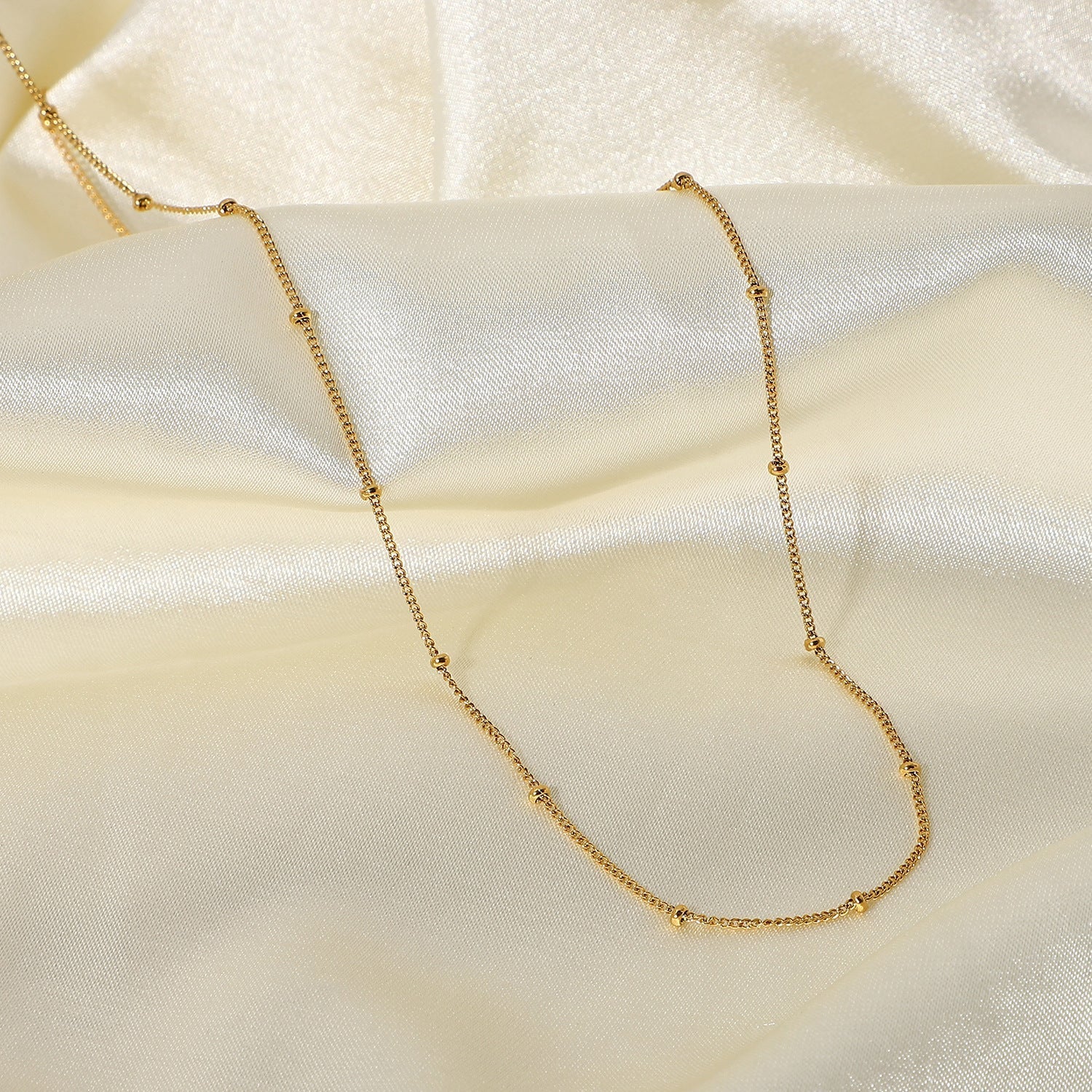 Ella - Gold Bead Chain Necklace — perfect for those who value comfort and design. Ella - Gold Bead Chain Necklace — perfect for those who value comfort and design.