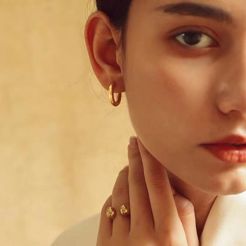 Annette - Round Hoop Earrings — perfect for those who value comfort and design. Annette - Round Hoop Earrings — perfect for those who value comfort and design.