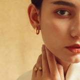 Annette - Round Hoop Earrings — perfect for those who value comfort and design. Annette - Round Hoop Earrings — perfect for those who value comfort and design.