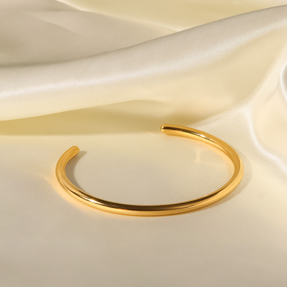 Alicia - Gold Bangle — bringing modern charm to your space.