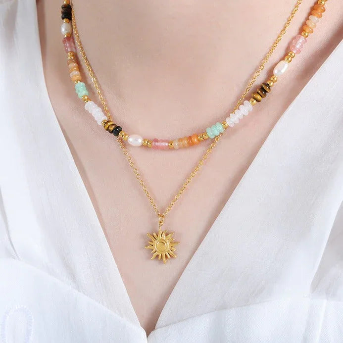 Sybil - Gold Sun Necklace — bringing modern charm to your space. Sybil - Gold Sun Necklace — bringing modern charm to your space.
