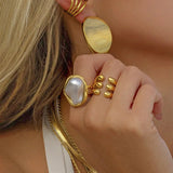 Cecilia - Gold Pearl Ring — perfect for those who value comfort and design. Cecilia - Gold Pearl Ring — perfect for those who value comfort and design.