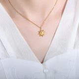 Sybil - Gold Sun Necklace — bringing modern charm to your space. Sybil - Gold Sun Necklace — bringing modern charm to your space.
