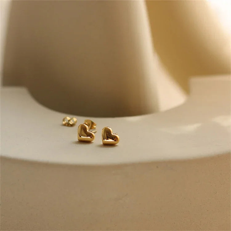 Tegan - Heart Earrings — bringing modern charm to your space. Tegan - Heart Earrings — bringing modern charm to your space.