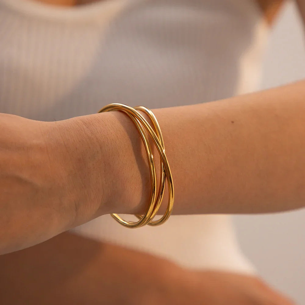 Molly - Twisted Gold Bracelet — perfect for those who value comfort and design. Molly - Twisted Gold Bracelet — perfect for those who value comfort and design.