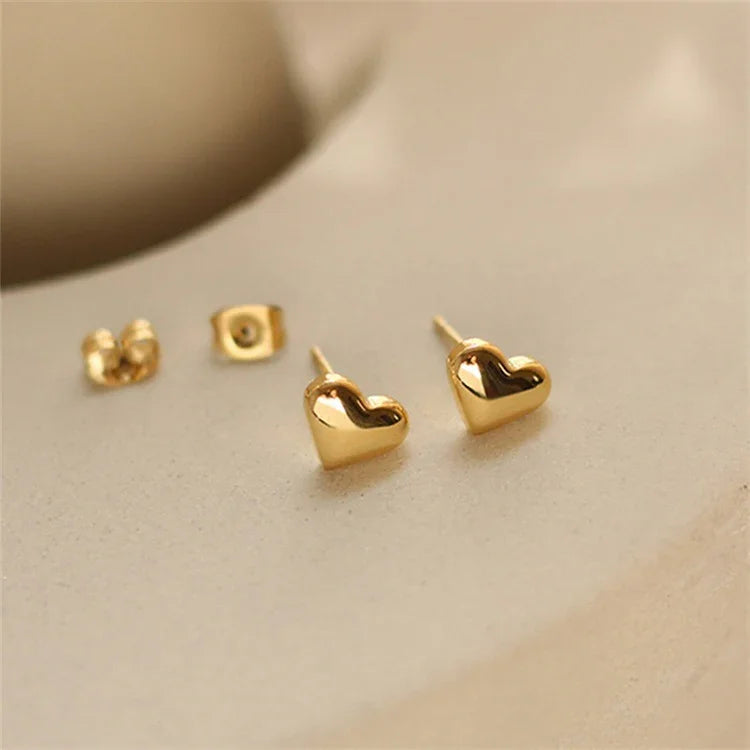 Tegan - Heart Earrings — bringing modern charm to your space. Tegan - Heart Earrings — bringing modern charm to your space.