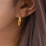 Evie - Gold Hoop Earrings — made with care and attention to detail. Evie - Gold Hoop Earrings — made with care and attention to detail.